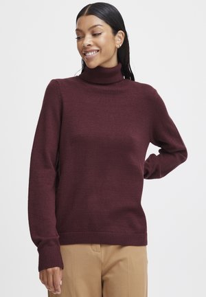 Burgunderfarbener Rollkragenpullover aus weichem, strukturiertem Stoff. Verfügt über lange Ärmel und gerippte Bündchen für eine figurbetonte, bequeme Passform.