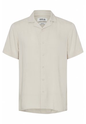 Short-sleeve, button-up shirt in light beige fabric. Features a pointed collar and a straight hem with a subtle brand label at the side.