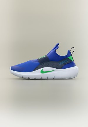 Blå og grøn slip-on sportssko med hvid sål, elastisk bånd over mellemfoden og teksten "Just Do It" på sidelænet.
