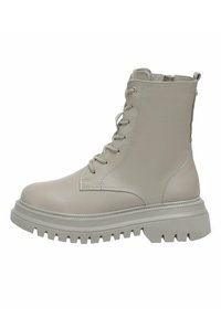 Bottine grise claire à lacets avec semelle épaisse crantée et fermeture éclair latérale, conçue pour un usage décontracté ou robuste.