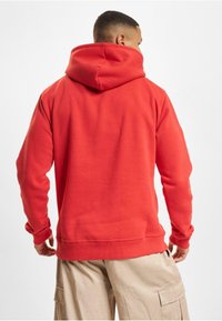 DEF ELF HELVETIC GUARDS  - Hoodie - tomato