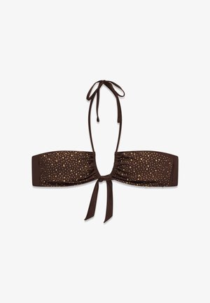 Top bikini bandeau marrone con pois metallici dorati, collo halter annodato e chiusura frontale a fiocco, mostrato su sfondo bianco.