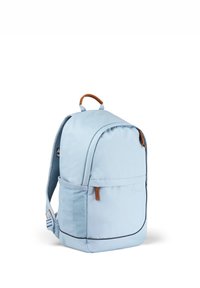 Light blue backpack with a rounded shape, textured side pocket, leather accents, and a top handle for carrying.