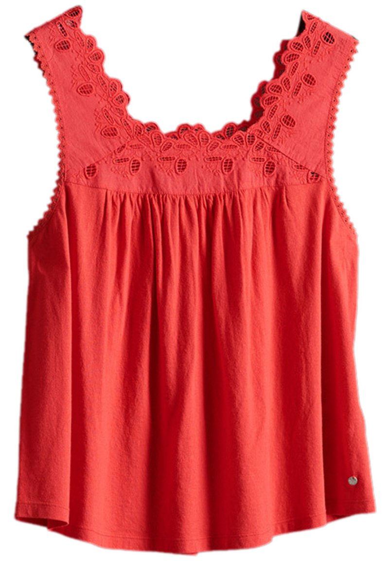Top senza maniche corallo con scollatura bordata in pizzo, corpetto arricciato, morbido tessuto di cotone e orlo arrotondato. Piccolo logo in fondo.