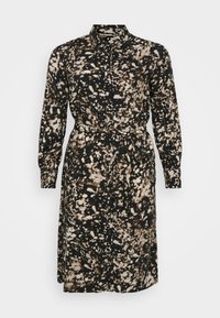 Robe à manches longues, ceinturée, à motif abstrait noir et beige. Col chemise, coupe droite et tissu doux et léger.