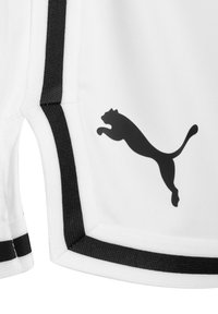 Puma sporta šorti balts poliesters ar melniem akcentiem, ar melnu lecoša pumja logo un melnām sānu svītrām.