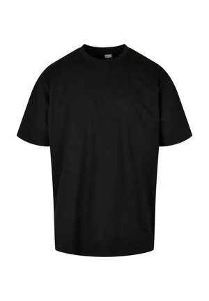 Juodas medvilnės marškinėliai su apvalia iškirpte ir trumpomis rankovėmis. Savybės: laisvas kirpimas ir lygus audinys. Nėra matomų raštų ar akcentų.