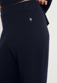 Next Sweter