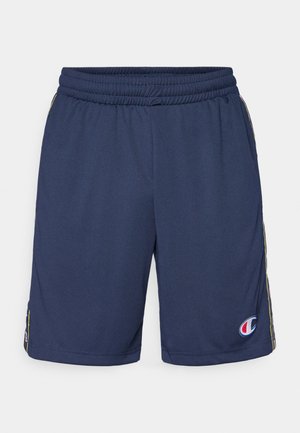 Shorts de sport navy avec une taille élastique, présentant des rayures sur les côtés et un petit logo sur l'ourlet gauche. Fabriqués à partir d'un tissu respirant.