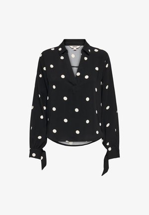 Černá halenka s dlouhým rukávem, bílými puntíky, výstřihem do V a zavazovacími manžetami na rukávech.