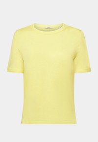 T-shirt gialla a maniche corte realizzata in morbido cotone. Collo rotondo, design semplice, con cuciture uniformi e senza loghi o motivi visibili.