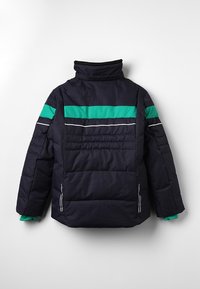 Veste matelassée bleu marine avec col haut, bande horizontale teal sur la poitrine et les manches, et détails de piping réfléchissant blanc dans le dos.