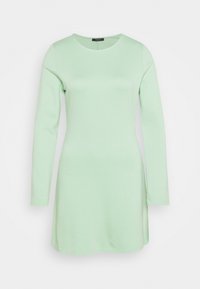 Långärmad klänning i ljus mintgrön, tillverkad av mjukt, något stretchigt tyg. Har rund halsringning och rak skärning ner till höften.