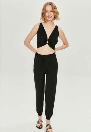 Pantalon de survêtement - black