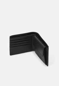Black leather wallet with a bifold design. Features multiple card slots and a compartment for bills. Soft texture, minimalistic style.