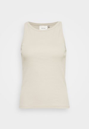 Débardeur beige clair en tissu côtelé avec un col rond et une conception sans manches. Présente une étiquette de marque discrète à l'intérieur.