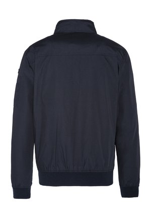 Navy blue jacket with a standing collar, ribbed cuffs and hem, featuring a pocket on the left sleeve and a smooth fabric texture.