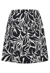 Jupe à motifs de feuilles en noir et blanc avec une taille élastique, présentant une forme décontractée et un tissu texturé. Finit juste au-dessus du genou.