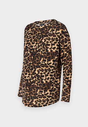 Leoparda raksta garām piedurknēm, ar brīvu piegriezumu, apaļu kakla izgriezumu un mīkstu audumu ar brūniem un melniem plankumiem uz gaiša fona.