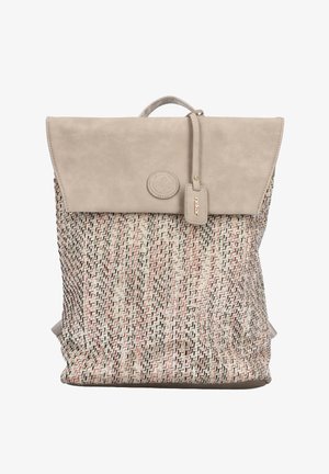 Beige and multicolored woven backpack with a smooth beige flap, top handle, and small branded leather tag hanging from the flap.