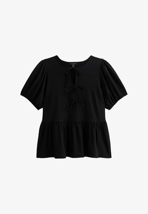 Schwarzes Peplum-Top aus weichem Stoff, mit kurzen Puffärmeln, rundem Halsausschnitt und drei Bindearbeiten an der Vorderseite. Glatte Textur.