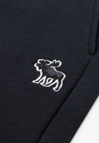 Abercrombie & Fitch ESSENTIAL JOGGER - Tracksuit bottoms - anf anthracite