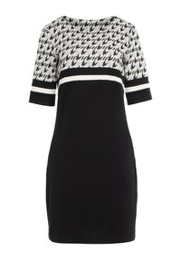 Czarna sukienka z wzorzystą szaro-skalną górą, z wzorem w zębatkę. Posiada okrągły dekolt i krótkie, podwinięte rękawy z białymi paskami.
