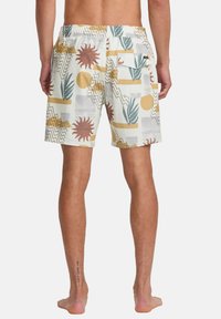 Pantaloni da bagno in tessuto leggero con un motivo astratto colorato che presenta motivi di sole e piante, vita elastica e tasca posteriore con patta.