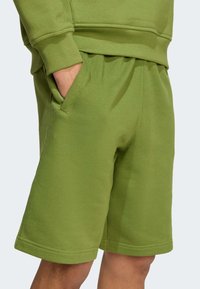 adidas Originals Tepláky - tech olive