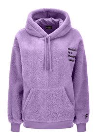 Purple fleece hoodie with a kangaroo pocket, drawstring hood, and black text saying "Motion is a therapy" on the front. Soft, textured fabric.