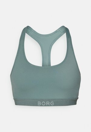 Sportbh in gedempt teal, gemaakt van gladde stof. Heeft een racerback ontwerp en een contrasterende band met het "BORG" logo.