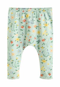 Grüne Blumenleggings mit einem dehnbaren Bund, verstreuten bunten Blumenmustern und gerafften Säumen an den Knöcheln.