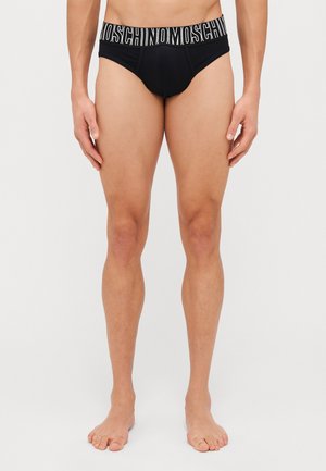 Schwarze Herrenunterhosen mit einem breiten elastischen Bund, der weiße Beschriftungen zeigt. Der Stoff ist glatt und dehnbar mit einer figurbetonten Passform.