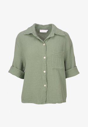 Hellgrünes, knopfzeitiges Hemd aus strukturiertem, zerknittertem Stoff. Mit Kragen, Brusttasche und hochgekrempelten Ärmeln.