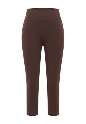 Leggings marron taille haute, longueur cheville, en tissu lisse et extensible, sans coutures ni poches visibles.