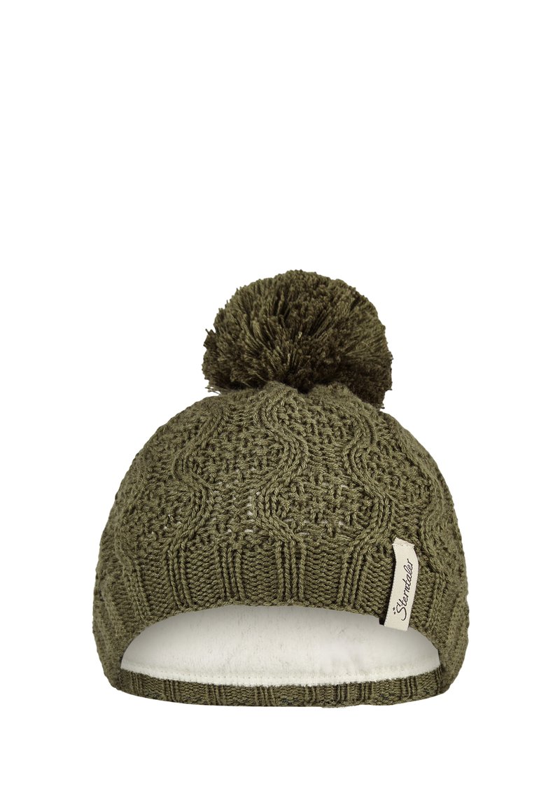 Olive green knit winter hat with a pom-pom on top and a white inner lining, featuring a small fabric brand tag on the side.