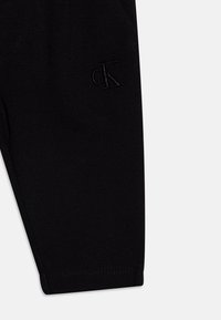 Calvin Klein Jeans BABY CEREMONY PUNTO PANTS UNISEX - Kalhoty - black