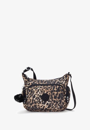 Leopard print crossbody bag made of fabric, featuring a black logo, two zippered pockets, and a detachable pom-pom keychain.