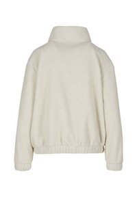 Veste en polaire de couleur crème avec manches longues, col montant et taille élastique vue de dos sur fond blanc.