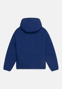 Giacca a vento imbottita di colore blu navy, con cappuccio, dal tessuto liscio, con polsini elasticizzati e orlo arrotondato. Senza hardware o loghi visibili.
