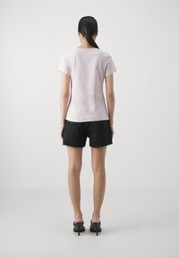 Calvin Klein Jeans MONOLOGO V NECK TEE - Print T-shirt - rose