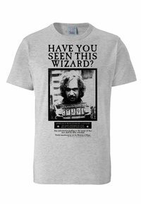 Gray cotton t-shirt featuring a black and white wanted poster design with text and a photo, illustrating a wizard with long hair and identification number.
