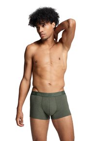 Herren-Boxershorts aus dunkelgrünem Baumwollmischgewebe. Elastischer Bund mit Logo. Figurbetonter Schnitt und glatte Textur. Kurze Beinlänge.