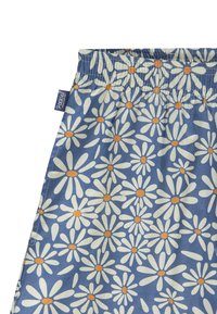 Tessuto blu con motivo di margherite con petali bianchi e centri arancioni, vita arricciata con elastico e un piccolo marchio attaccato.