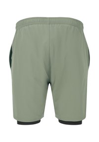 Gröna träningsshorts med resårmidja, med sidofickor och svart innerfoder, utformade för komfort och rörlighet.