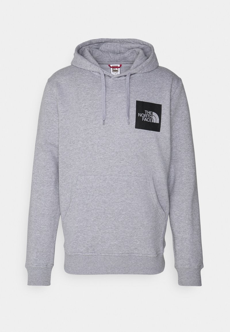 Sweat à capuche gris clair avec poche kangourou frontale et patch logo carré noir portant l’inscription « The North Face » sur la poitrine gauche.