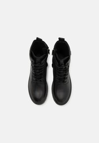 Calvin Klein Jeans COMBAT BOOT MID - Botines con plataforma - triple black