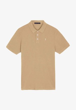 Beiges Poloshirt aus weichem Stoff mit klassischem Kragen, dreiknöpfiger Blende und kleinem gesticktem Logo auf der linken Brust.