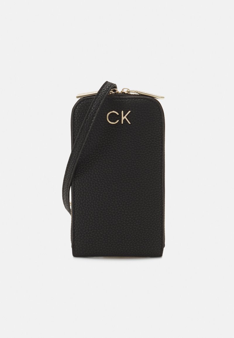 Calvin Klein RE LOCK PHONE CROSSBODY Phone case black Zalando