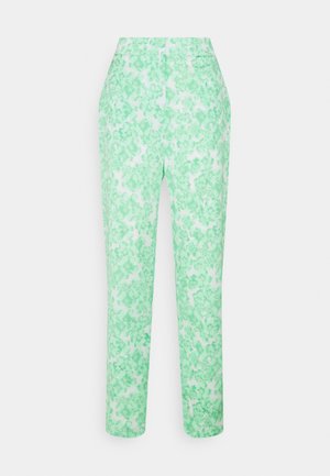 Un pantalon à motifs floraux de couleur vert clair et blanc, avec une taille haute, une coupe droite et une texture de tissu lisse.